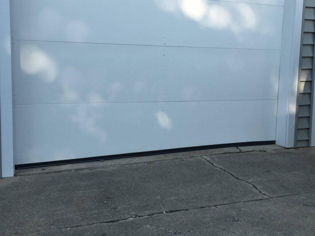 White flush panel garage door