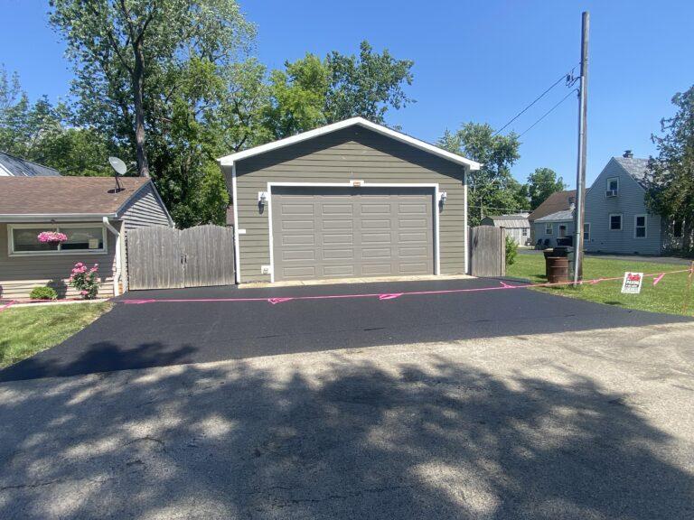 Garage Doors and More, Inc. - Gray Garage Door