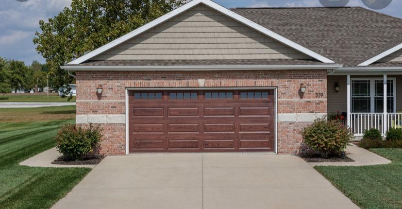 Wood-toned long panel garage door 
