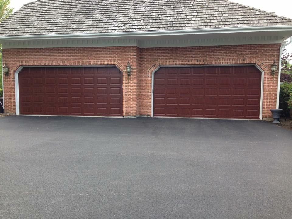 Two red traditional garage doors