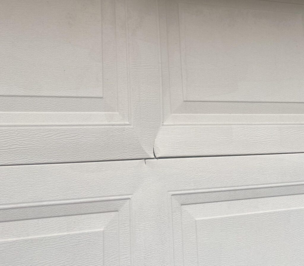 Damaged garage door panel