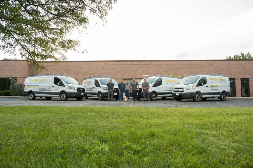 The fleet of vans at Garage Doors and More